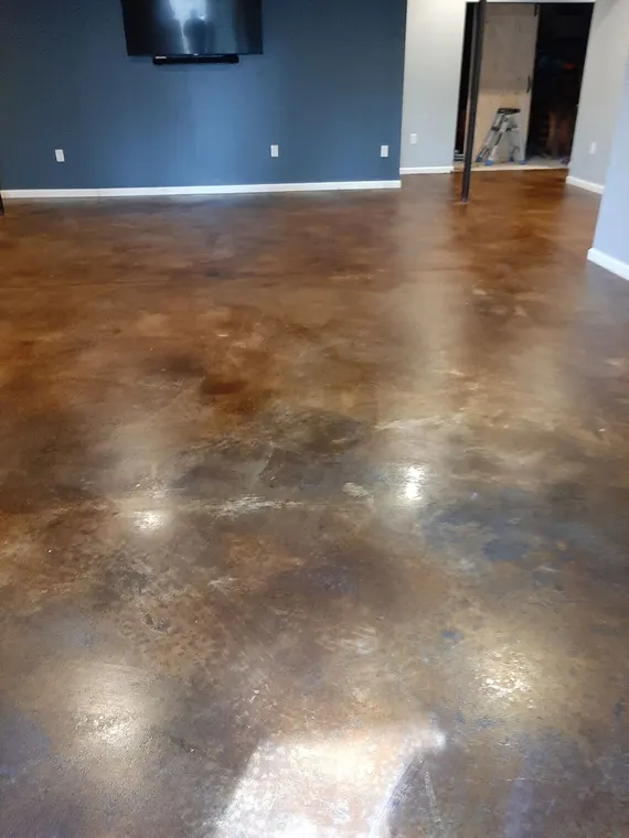 Copper and brown stained concrete floor with a soft gloss